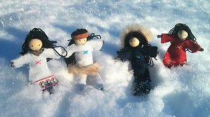 Dolls. Indian in snow